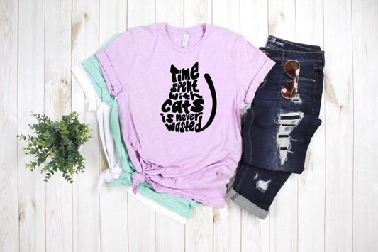 Time Spent With Cats Is Never Wasted printed on a T-Shirt