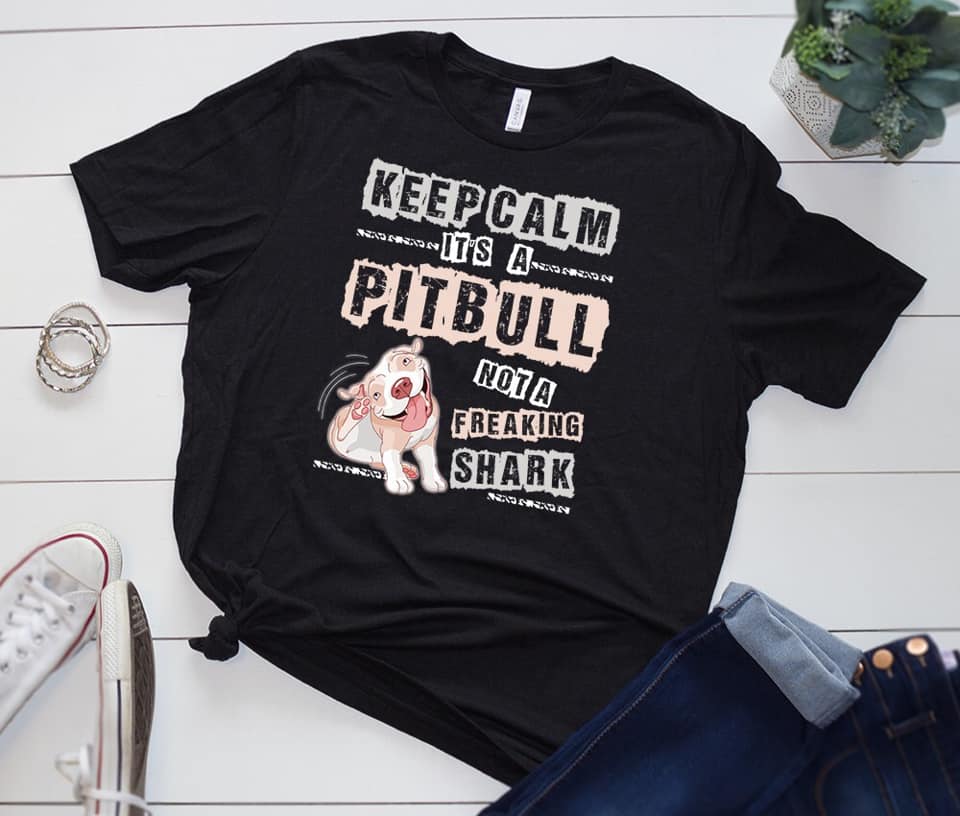 "Keep Calm Its A Pitbull Not A Freaking Shark" written on a Pittie Lover Shirt